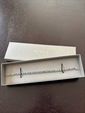 Peoples Blue Topaz Tennis Bracelet